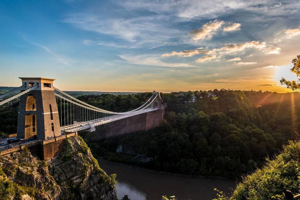 Clifton Suspension Bridge, Bristol, UK with sunset and sunbeams
