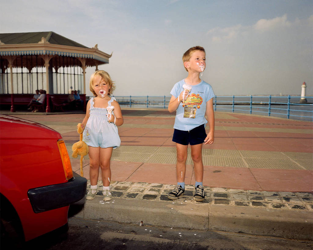 Children eating ice cream on a beach
