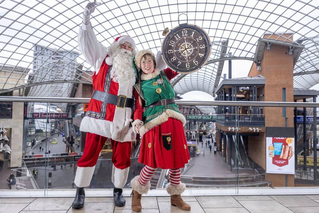 Santa and an elf in Cabot Circus