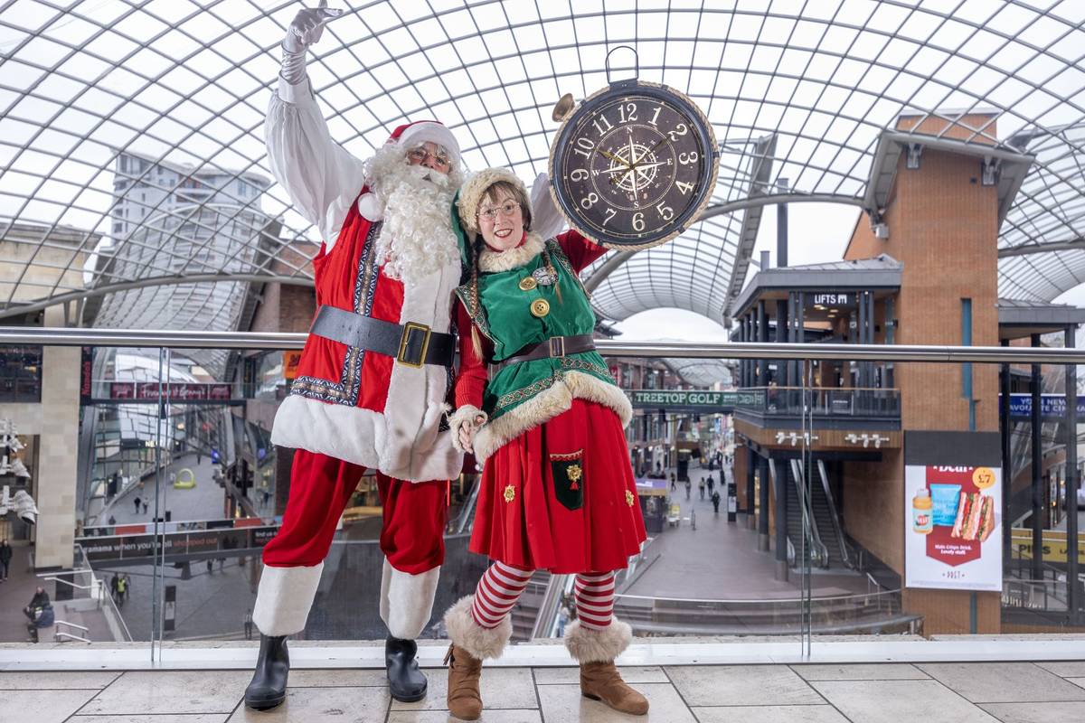 Santa and an elf in Cabot Circus