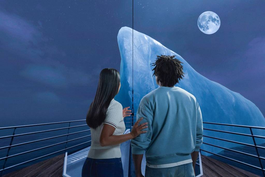 Titanic VR exhibition guests exploring the experience and looking at the ship