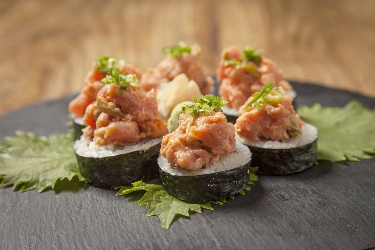 gambler roll from sunda with spicy tuna, kani, cucumbers, scallions, kampyo, avocado, ghost pepper sambal *ghost peppers