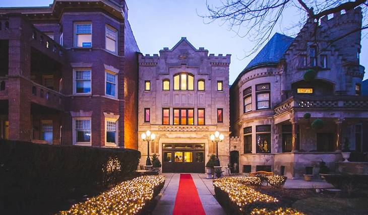 This historic mansion in Chicago was once a Knights Templar Masonic lodge — with a marble lobby, fairytale ballroom and vintage carved-wood bar