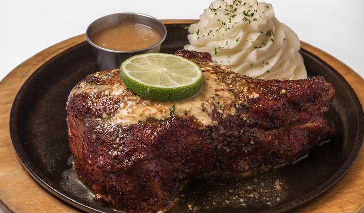 Perry’s Steakhouse is offering 79-cent lunch specials at all Chicago-area locations for one day only, including its famous slow-smoked pork chop
