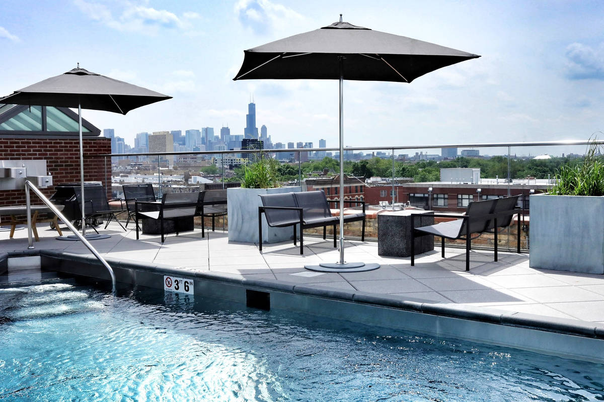 This Chicago Rooftop Pool Feels Like a Private Beach Club—And Anyone Can Go