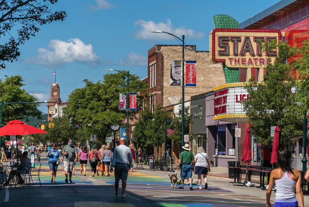 Busy Front Street in downtown with State Street Theater.