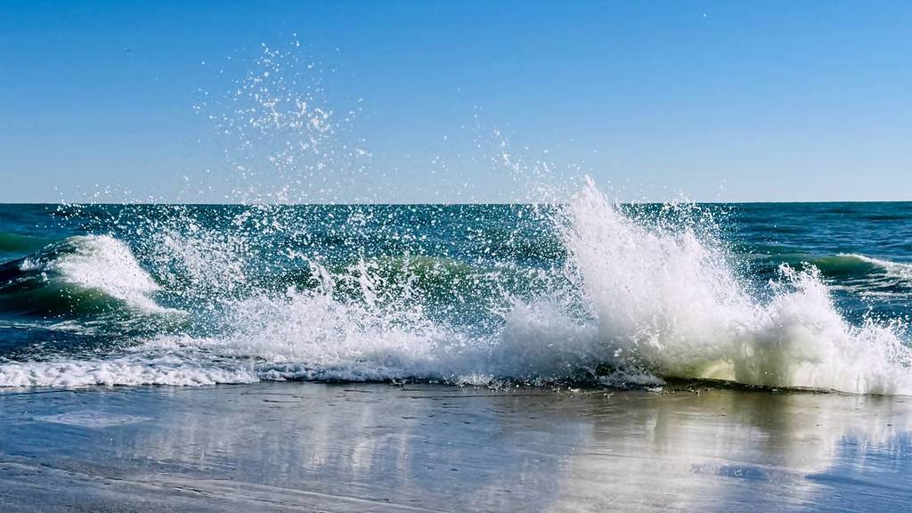 Lake Michigan beach breaking high waves in Chicago USA