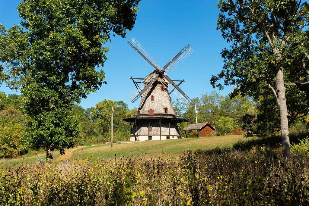 Old Dutch windmill from the mid 1850's on a beautiful Autumn afternoon. Fabyan Forest Preserve, Geneva, Illinois