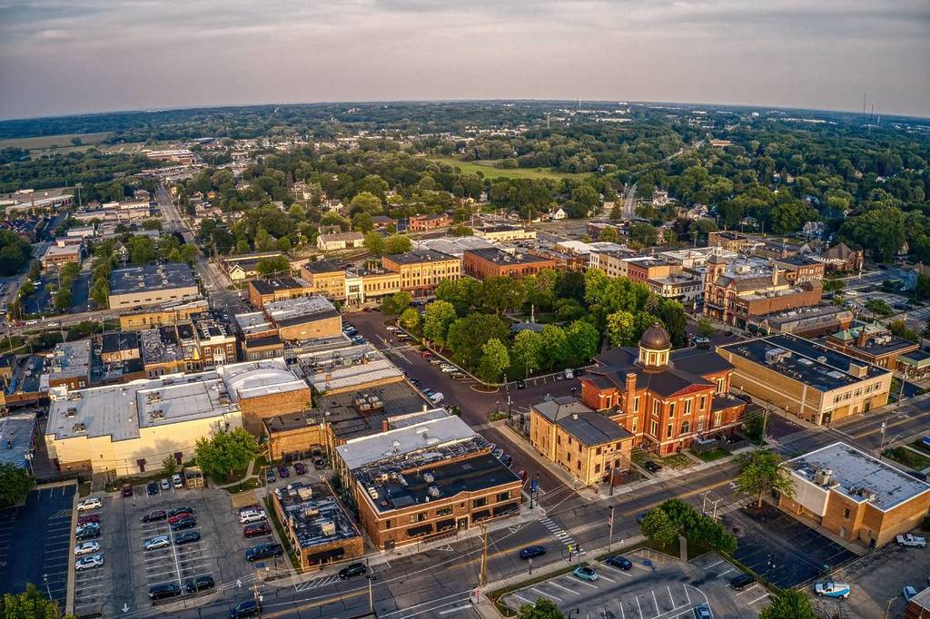 Aerial View of Downtown Woodstock, Illinois during Summer Twilight