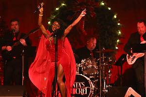 Performers wear holiday costumes at Santa's Secret