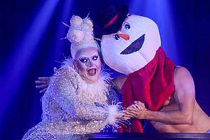 Performers wear holiday costumes at Santa's Secret
