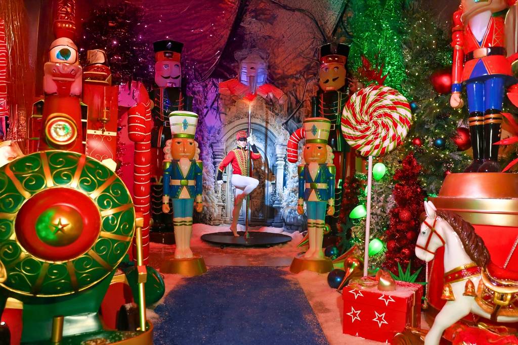 Performers wear holiday costumes