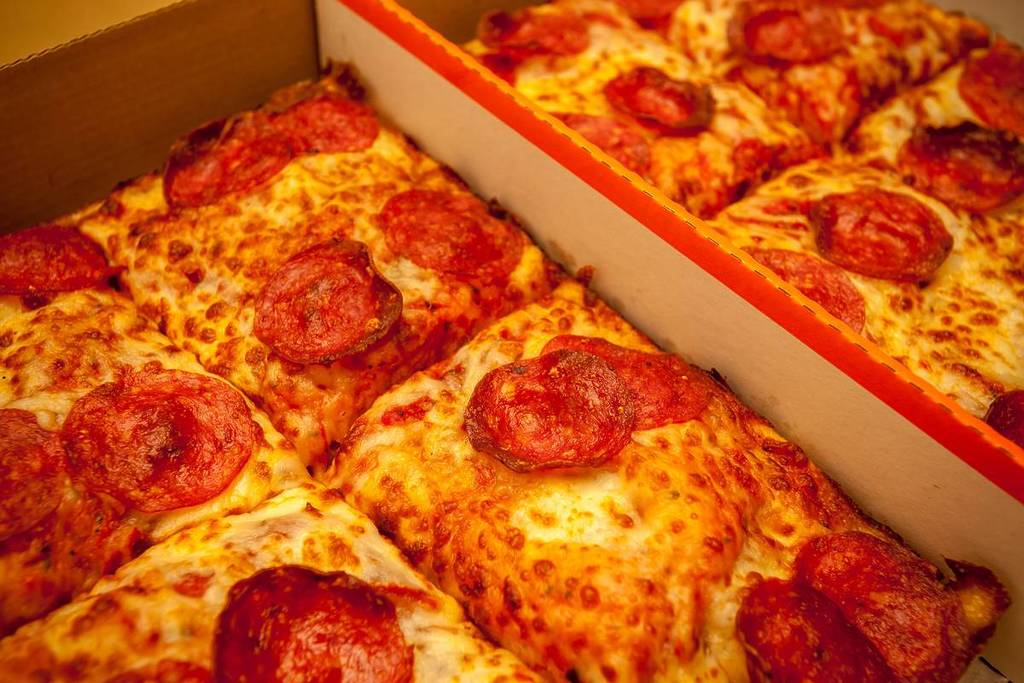 Pepperoni slices of Detroit style deep dish pizza, part of the Lunch Combo at a Little Caesars franchise in New York