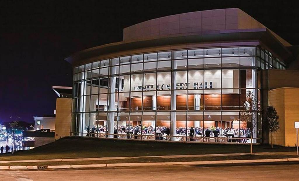 The grand, glass exterior of Wentz Concert Hall & Fine Arts Center.