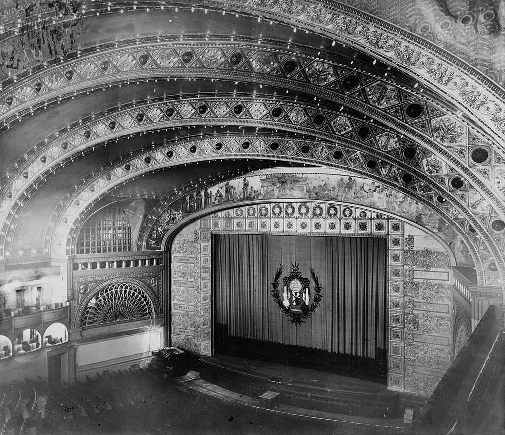 A black and white photo of the auditorium at University of Illinois.