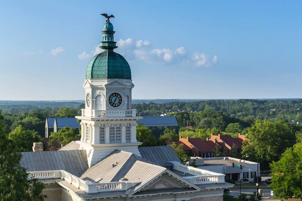 A late afternoon view of a downtown courthouse in late spring