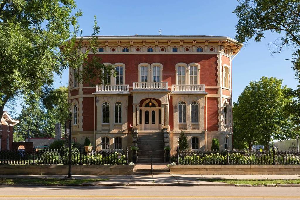 Exterior of the historic Reddick Mansion, built in 1855, on a beautiful Summer morning in downtown Ottawa, Illinois.