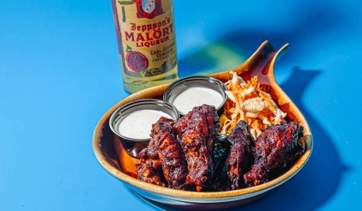 Wing champion Woodie’s Flat launches Malört BBQ sauce wings for a limited time