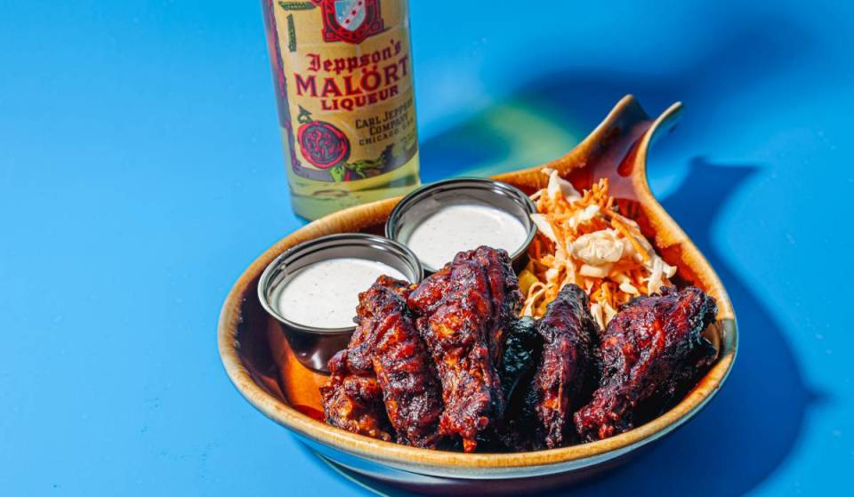 Wing champion Woodie’s Flat launches Malört BBQ sauce wings for a limited time