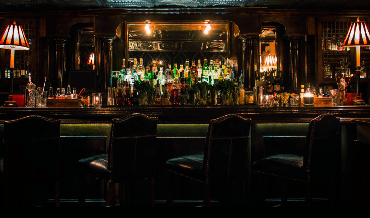 This Speakeasy Den Is Hidden Behind Some Dumpsters In An Alley