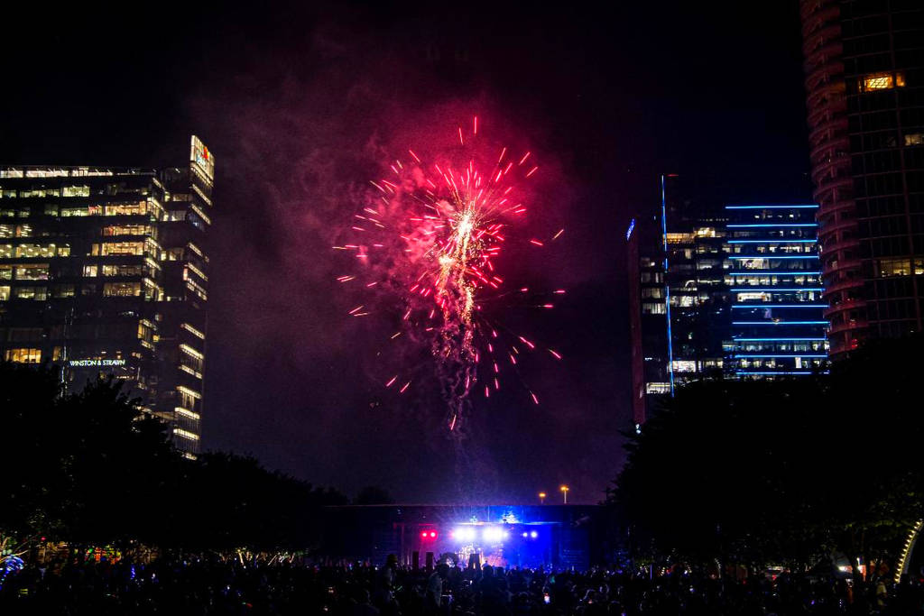 Image shows fireworks at Klyde Warren Park's Independence Day celebration