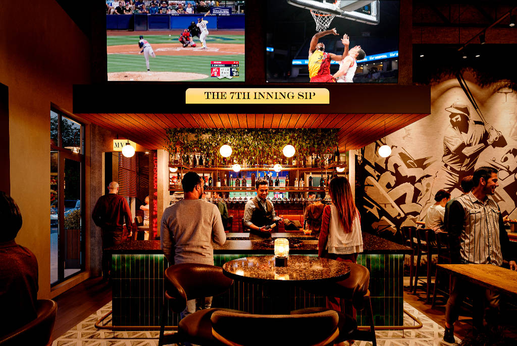 Image shows the bar under the emblem "The 7th Inning Sip" at Batbox in Dallas.