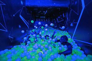 Guests navigate the dark at SENSAS