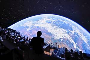 Guests marvel at Cosm's display