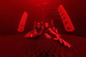 Guests make their way through Glow or Go's challenge rooms