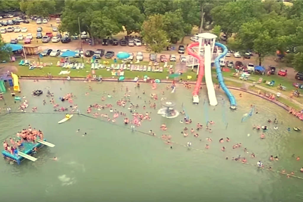Image shows a bird's eye view of Burgers Lake in Fort Worth.