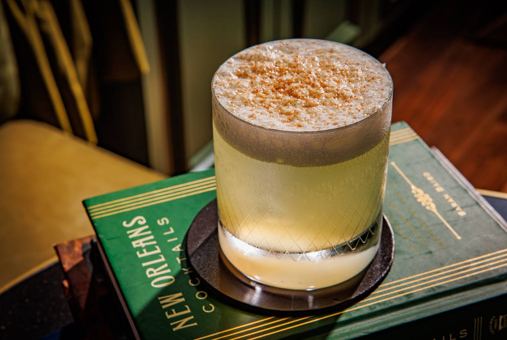 Image shows a cocktail from Cache cocktail lounge in Dallas