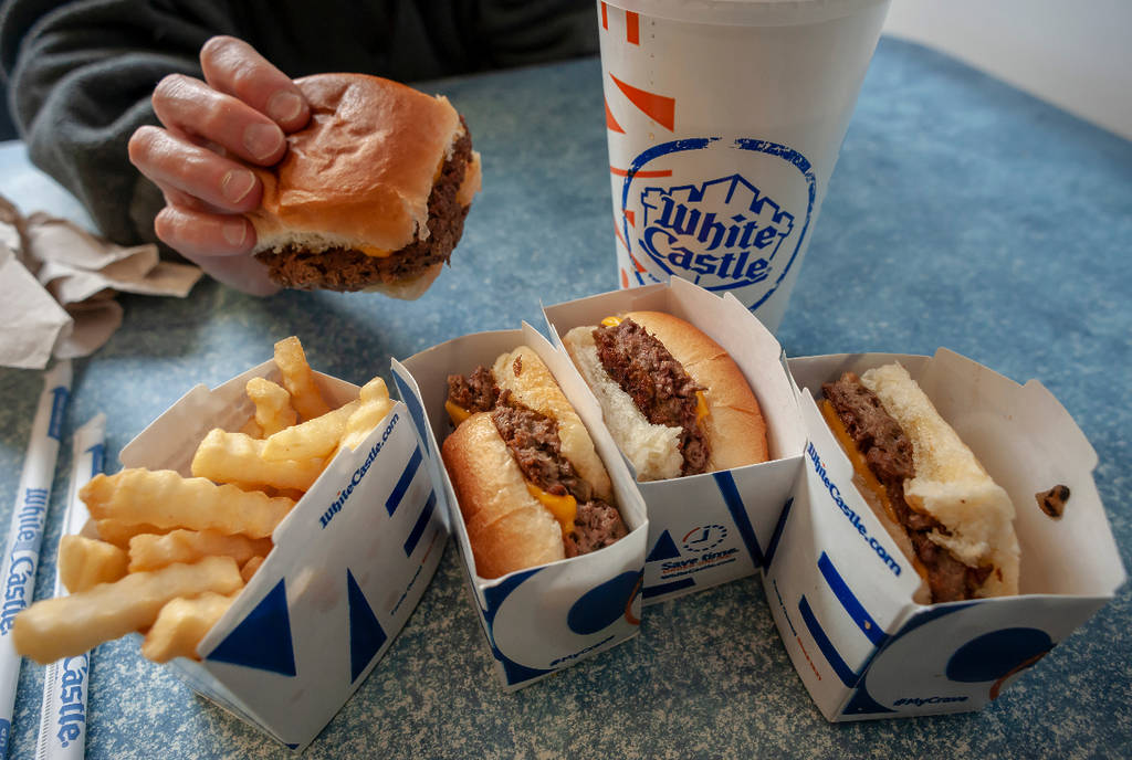 Image sliders, fries, and a drink on a table at White Castle
