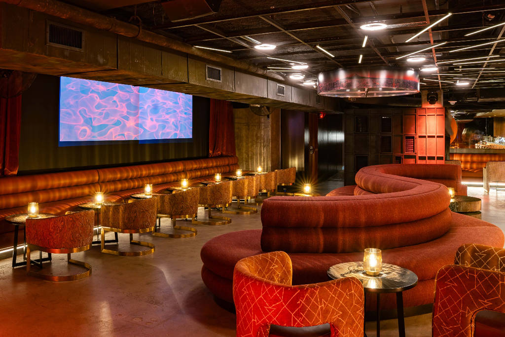 Image shows theDJ booth centerpiece at AKAI speakeasy in Dallas.