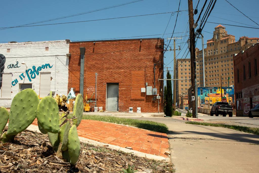Image shows buildings and a hotel in Mineral Wells, Texas