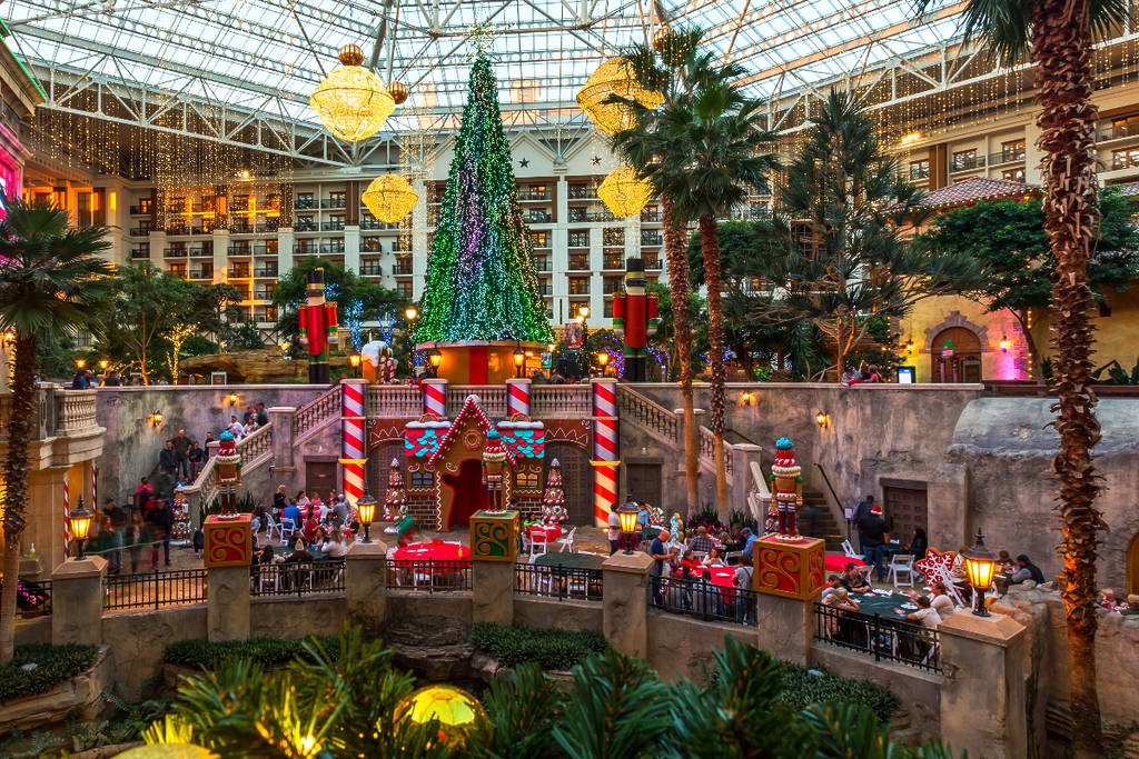 Image shows The Gaylord Texan adorned in holiday activations and decor.