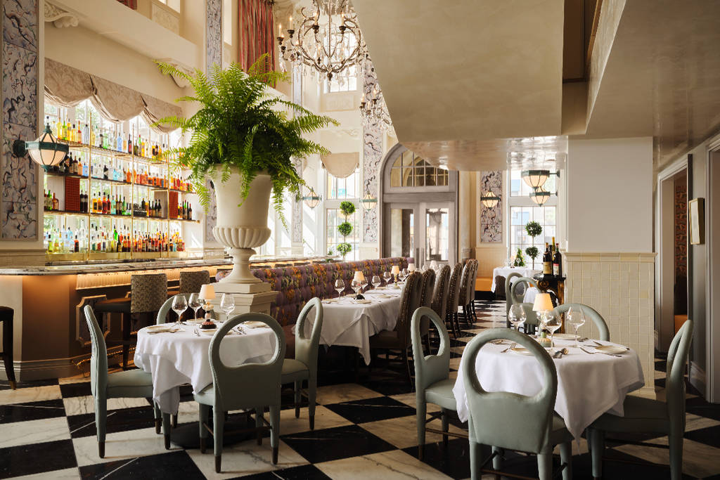 Image shows the dining area of Mister Charles in Dallas, Texas.