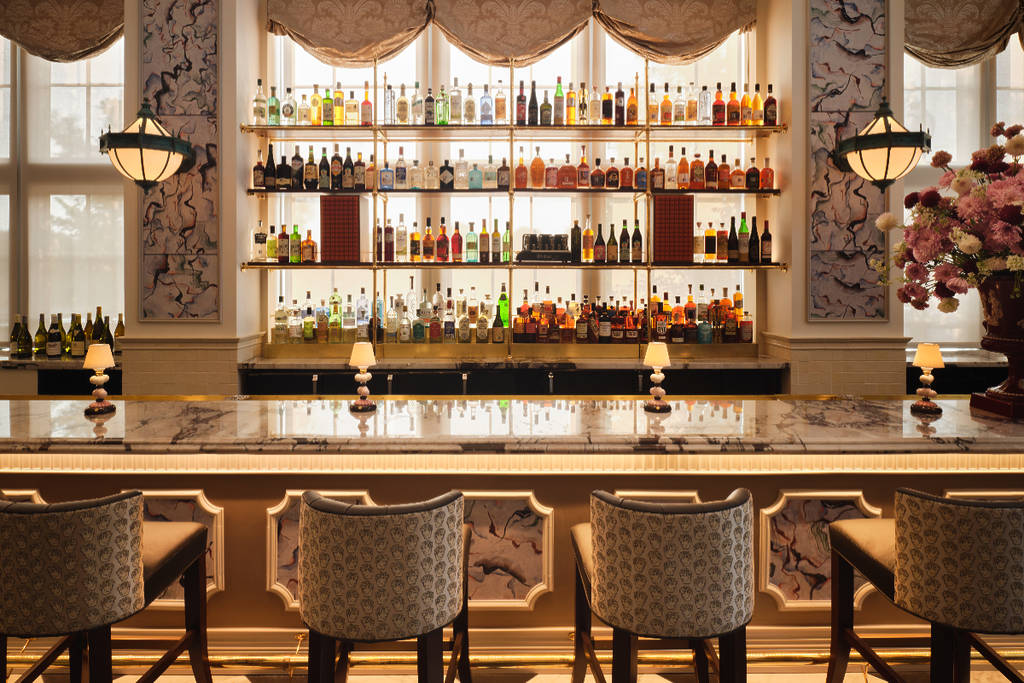 Image shows the bar area of Mister Charles restaurant in Dallas, Texas.