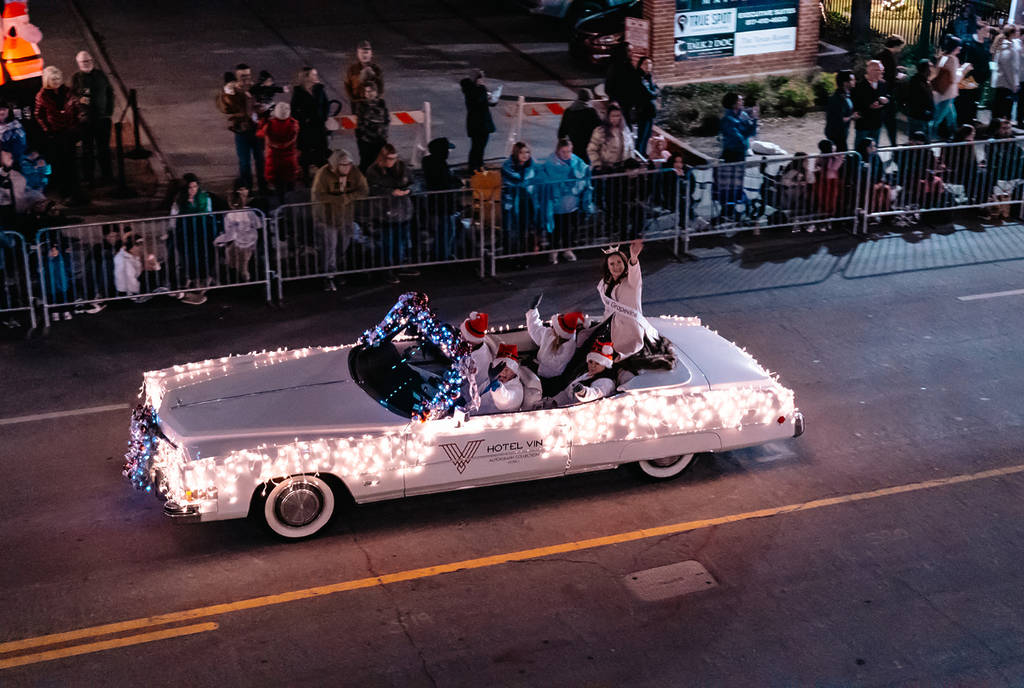 Image shows an illuminated car during the Grapevine Parade of Lights.
