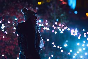 Guests walk among lights