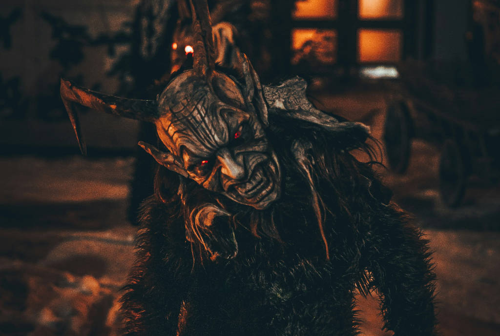 Image shows a creepy Krampus figure.