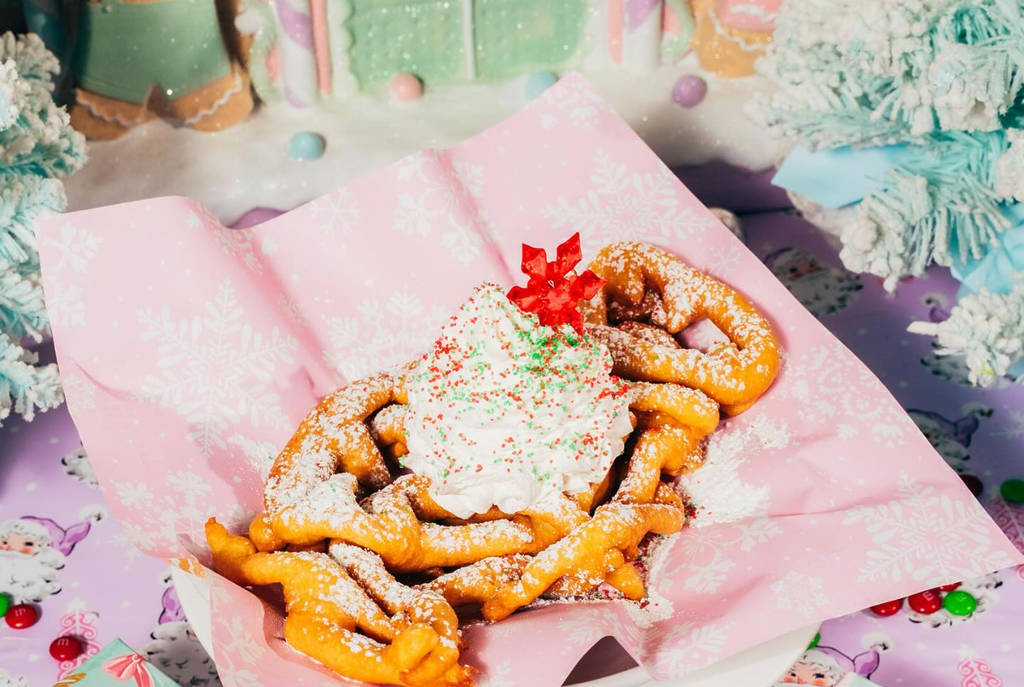 Image shows a seasonal funnel cake dish at Serious Eats Land of Sweets pop-up.