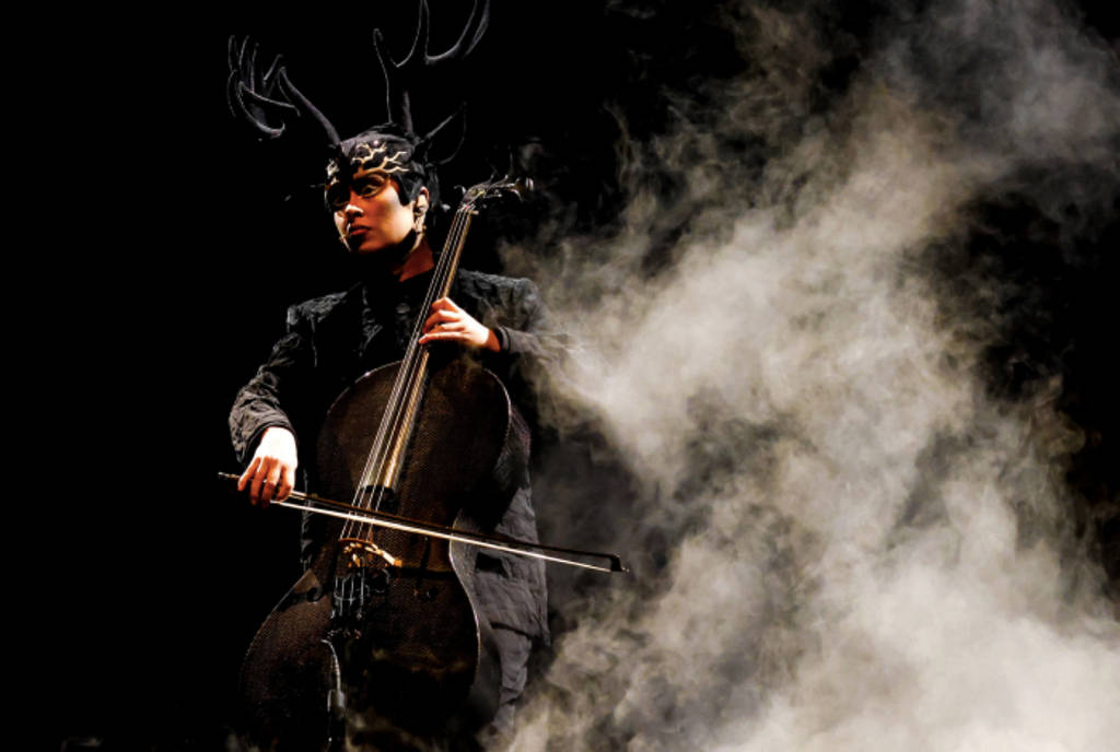 Image shows a musician in costume performing during "ECHO" by Cirque du Soleil.