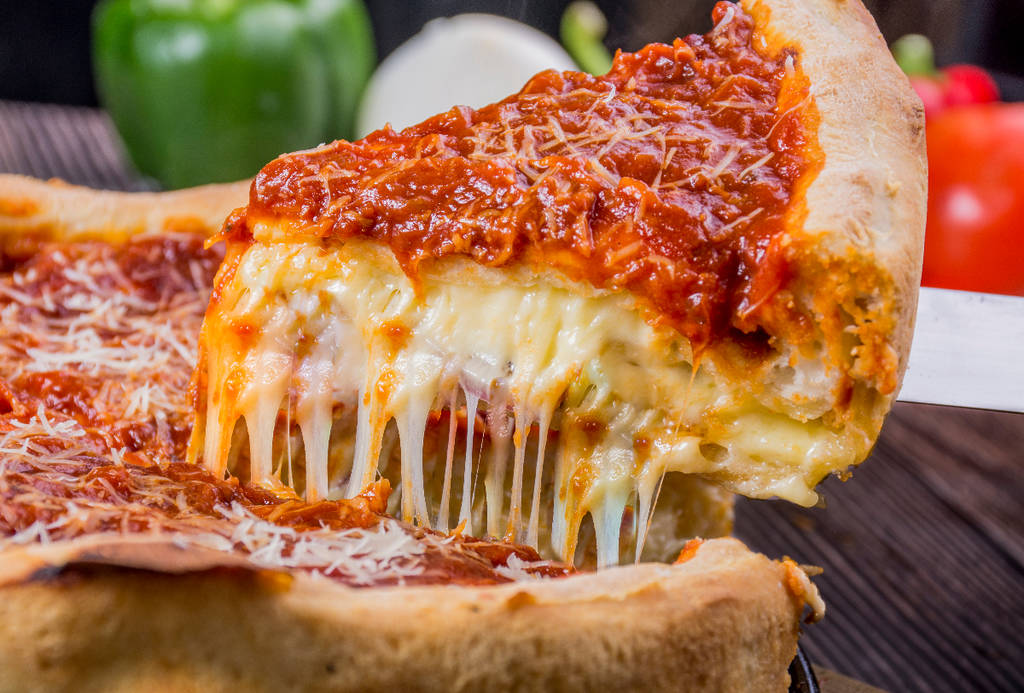 Image shows a deep dish pizza.