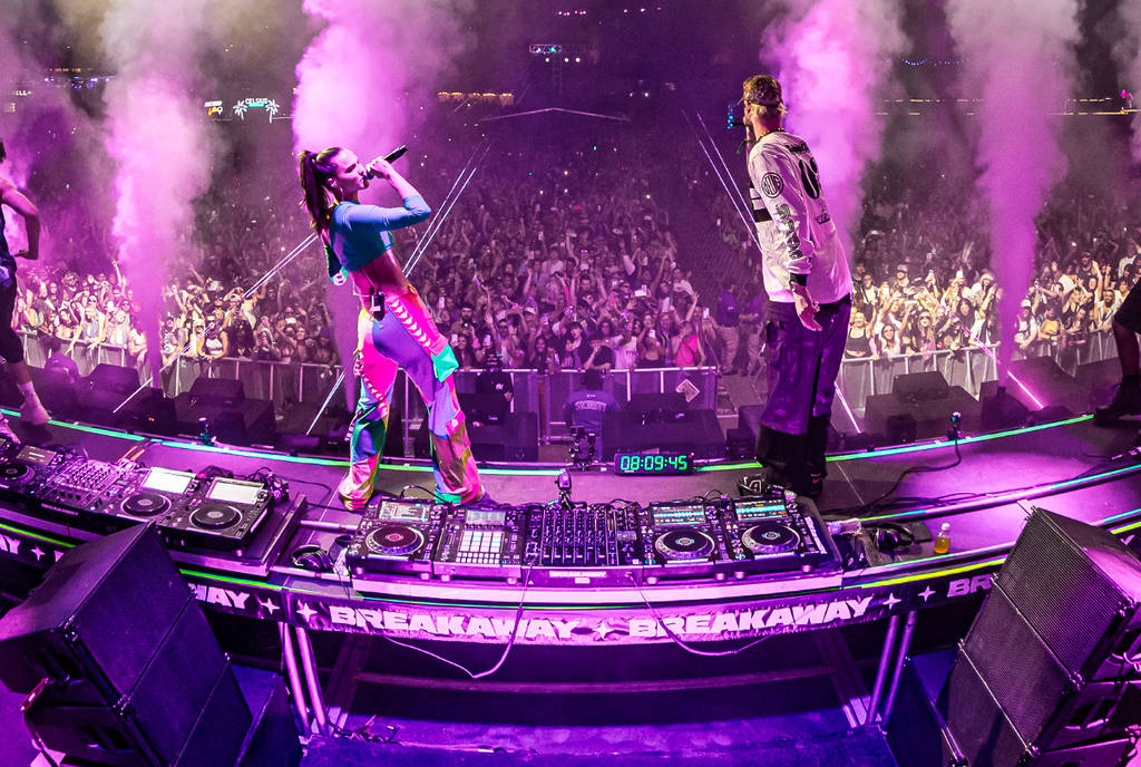 Image shows two musicians playing on stage for Breakaway Music Festival in Dallas.