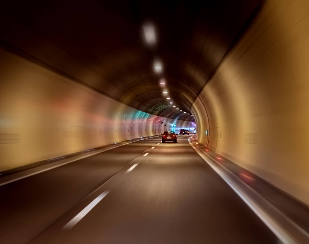Image shows a car in a tunnel 
