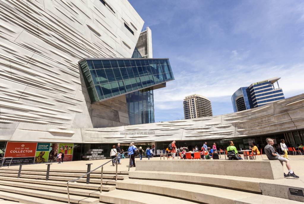 Image shows the outside of the Perot Museum of Nature and Science.