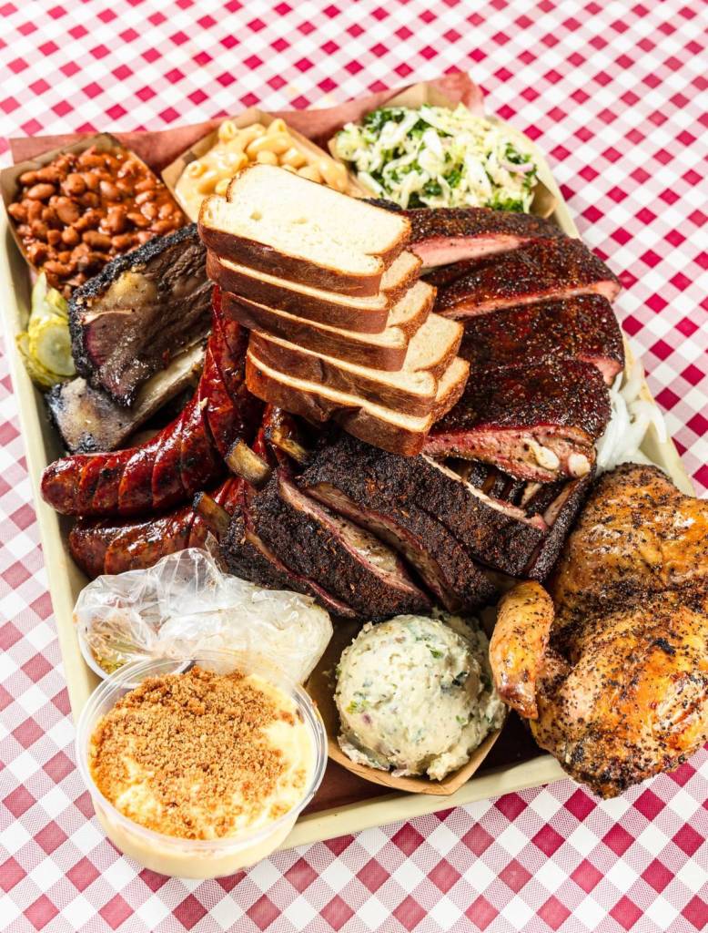Image shows a plate of barbecue at Goldee's.