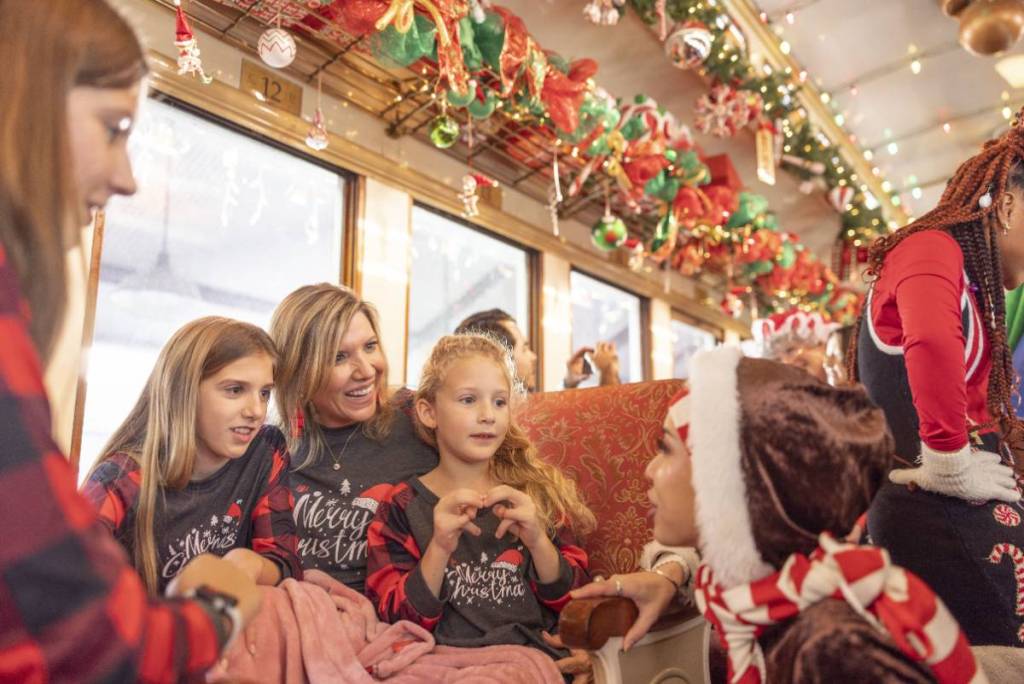 Image shows guests of a Christmas train.