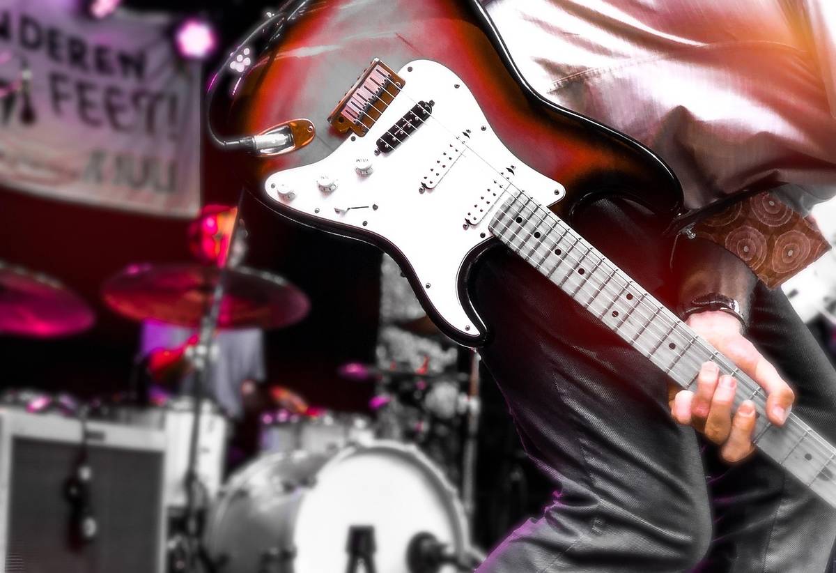 Guitar player performing on stage