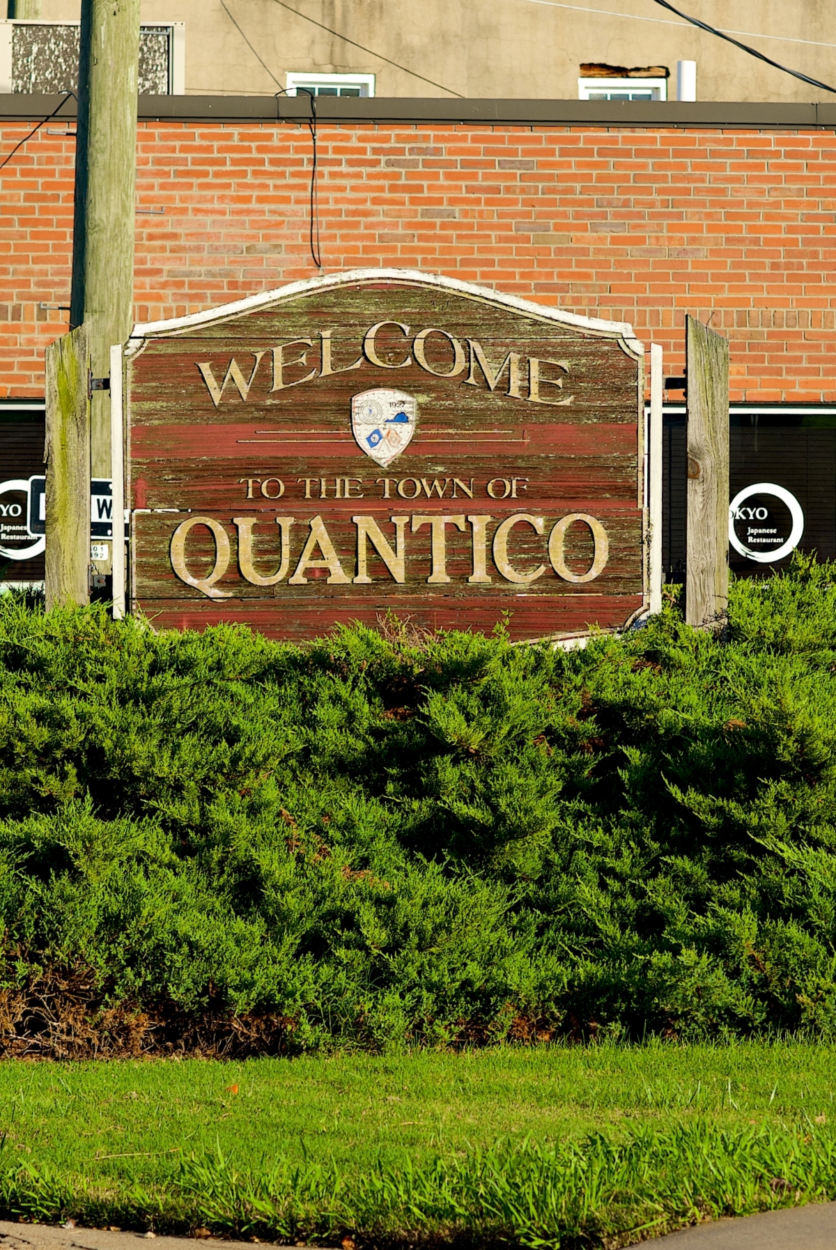A "Welcome to Quantico" sign greets visitors at the entrance to the historic town of Quantico, adjacent to the U.S. Marine Corps Base Quantico.
